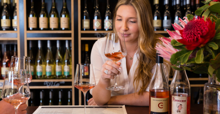 woman sipping wine